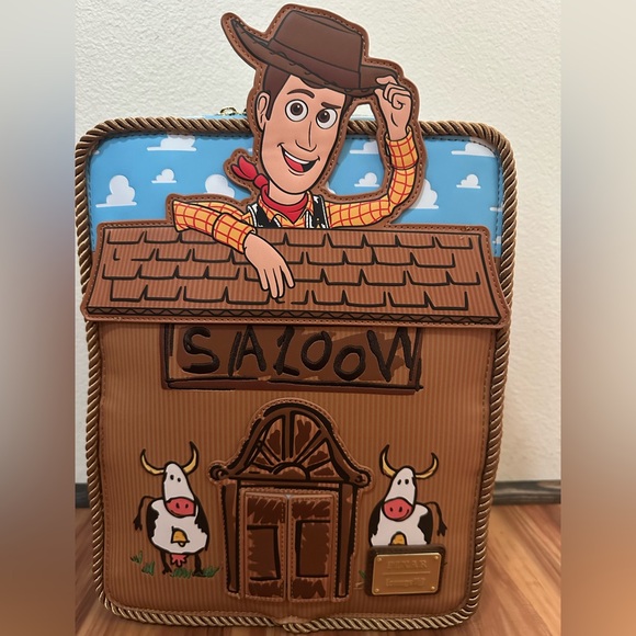 NWT Loungefly Disney Toy Story 30th anniversary Woody Saloon Backpack - Picture 3 of 5